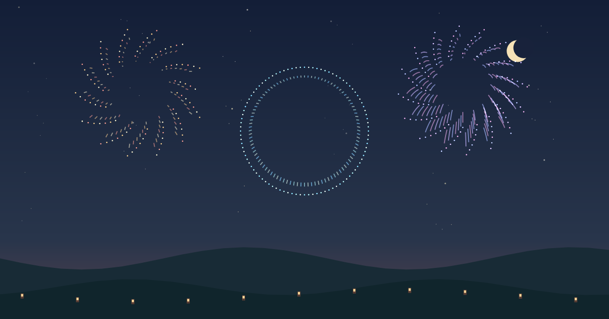 Gold, orchid and turquoise fireworks over a lantern-lit hillside